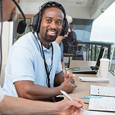 Student in sports press box